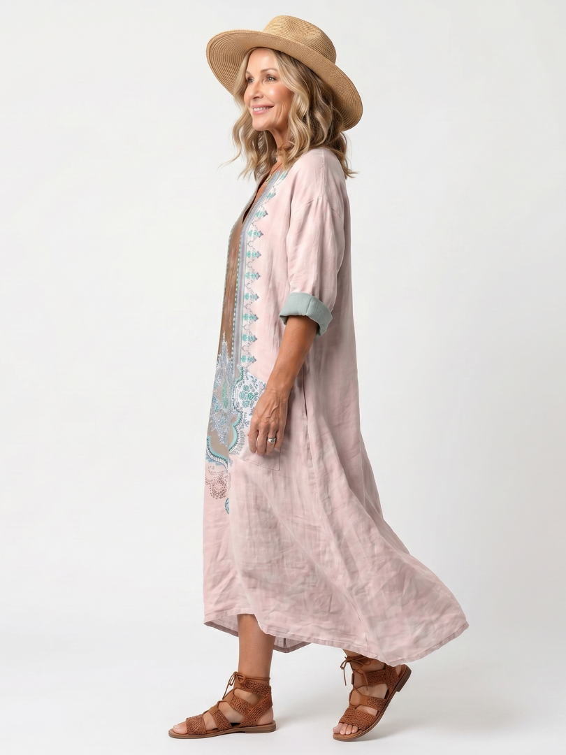 Vestido midi bordado rosa con bolsillos