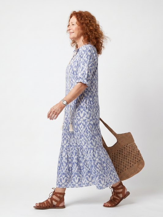 Vestido midi estampado con escote de lazada