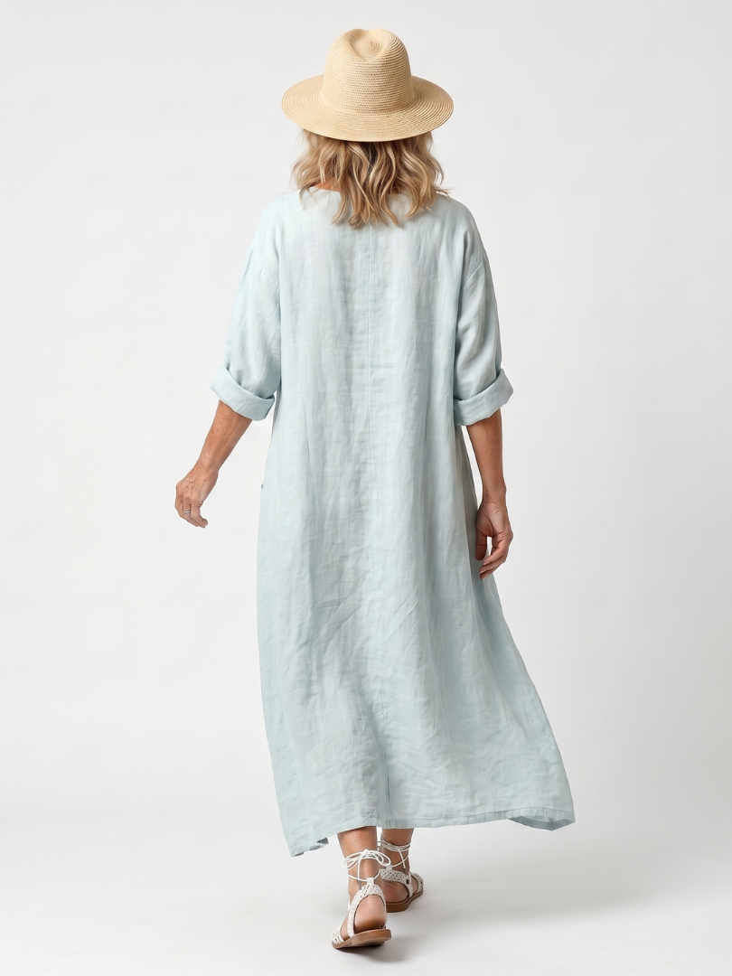 Vestido midi bordado con bolsillos