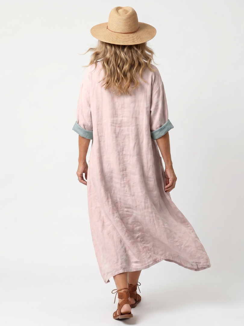 Vestido midi bordado rosa con bolsillos