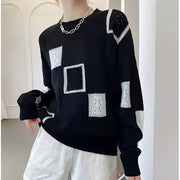 Geometric knit sweater